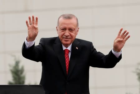 FILE PHOTO: Turkish President Erdogan greets supporters during a ceremony in Istanbul