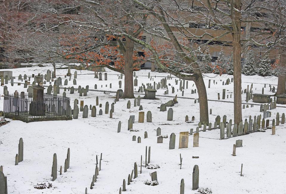 Hancock Cemetery in Quincy Square has a light dusting of snow on Tuesday, Jan. 31, 2023.