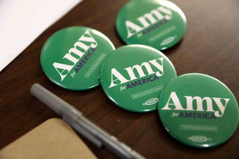 Buttons for Democratic U.S. presidential candidate Amy Klobuchar at an event in Fort Dodge
