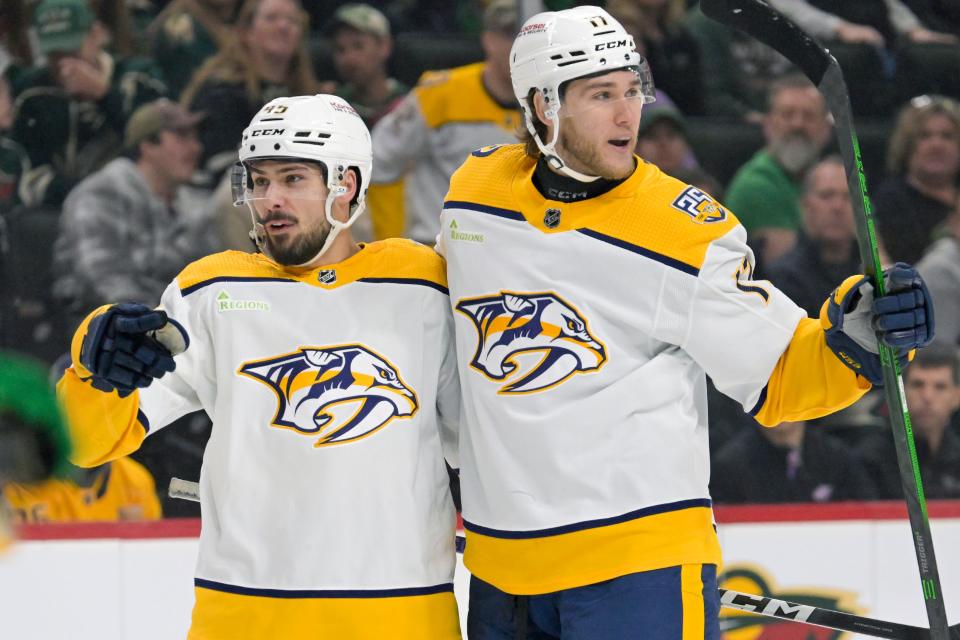 Mar 10, 2024; Saint Paul, Minnesota, USA; Nashville Predators forward Mark Jankowski (17) celebrates his goal against the Minnesota Wild with defenseman Alexandre Carrier (45) during the first period at Xcel Energy Center. Mandatory Credit: Nick Wosika-USA TODAY Sports