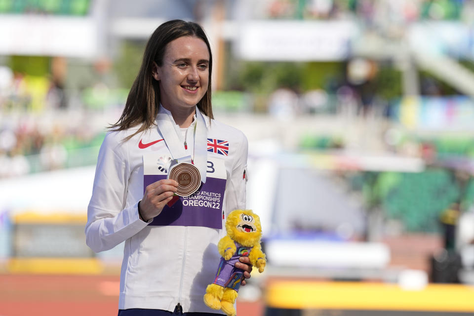 Bronze medalist Laura Muir, of Britain, poses during a medal ceremony for women's 1500-meter run the at the World Athletics Championships on Tuesday, July 19, 2022, in Eugene, Ore. (AP Photo/Gregory Bull)