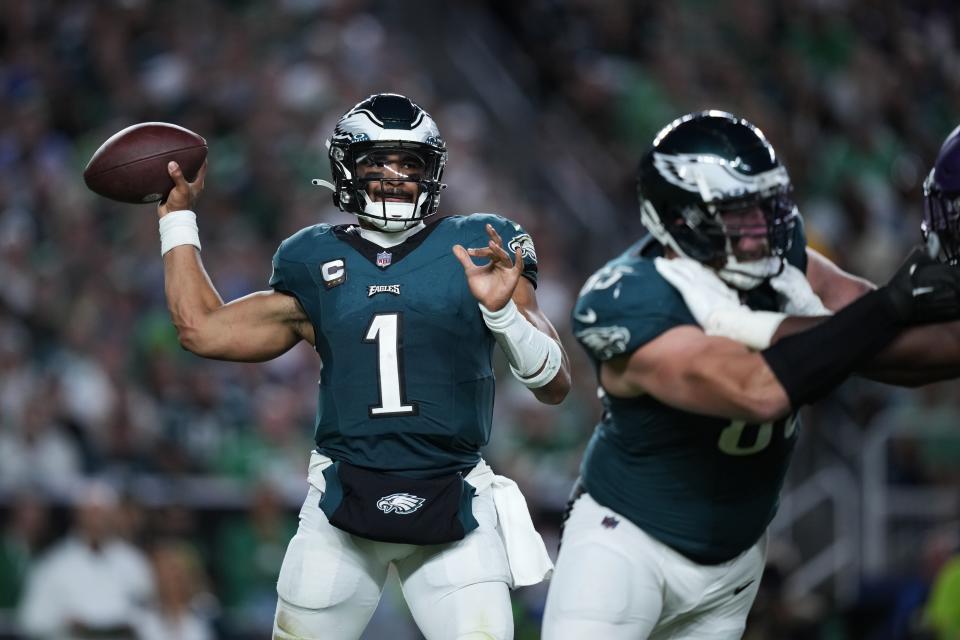 Philadelphia Eagles quarterback Jalen Hurts (1) looks to pass during the second half of an NFL football game against the Minnesota Vikings on Thursday, Sept. 14, 2023, in Philadelphia. (AP Photo/Matt Slocum)