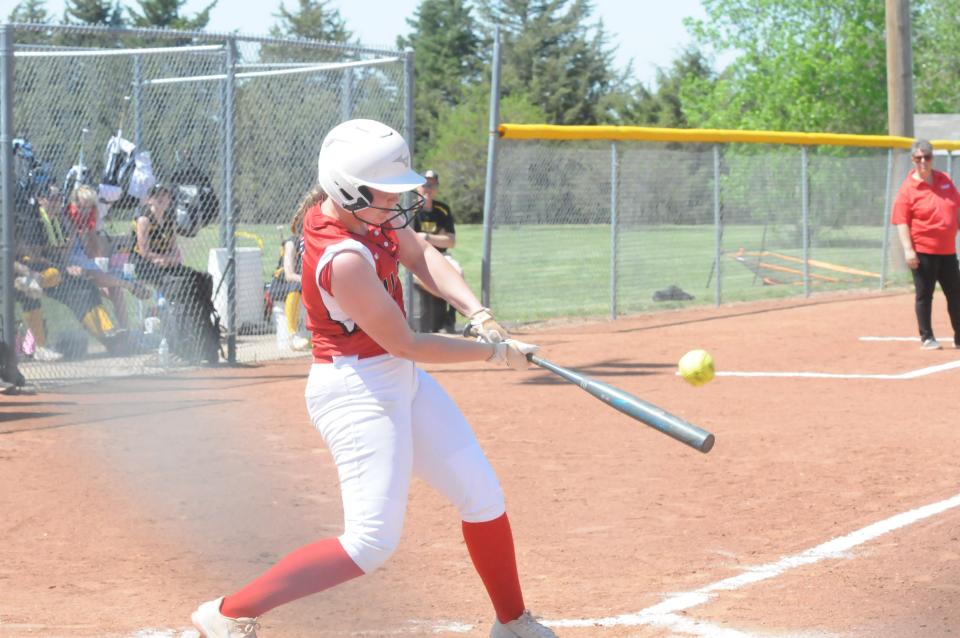 Ell-Saline's Brin Hecker (00) swings at a pitch during a doubleheader against Bennington Tuesday, May 10, 2022 at Bennington Sports Complex.