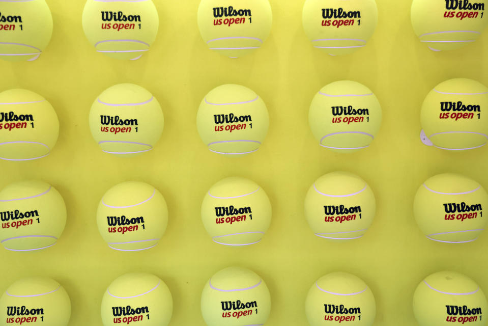 Tennis balls are displayed during the fourth round of the U.S. Open tennis championships, Sunday, Sept. 3, 2023, in New York. (AP Photo/Jason DeCrow)