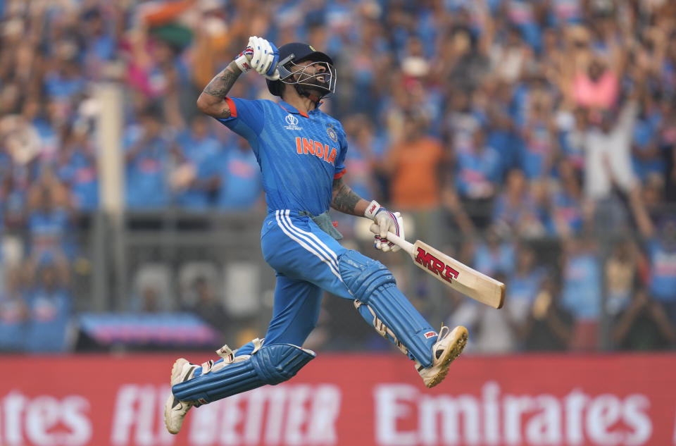 India's Virat Kohli celebrates his century during the ICC Men's Cricket World Cup first semifinal match between India and New Zealand in Mumbai, India, Wednesday, Nov. 15, 2023. (AP Photo/Rafiq Maqbool)