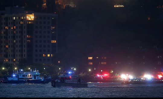 <p>In this photo taken from video, search and rescue boats look for a small plane that went down in the Hudson River, Friday, May 27, 2016, near West New York, N.J. A World War II vintage P-47 Thunderbolt aircraft crashed into the river Friday, May 27 killing its pilot. (AP Photo/Julie Jacobson) </p>