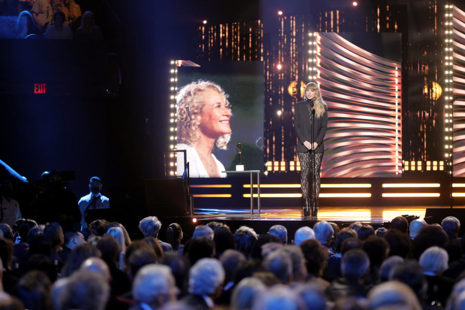 Taylor Swift inducts Carole King onstage during the 36th Annual Rock & Roll Hall Of Fame Induction Ceremony at Rocket Mortgage Fieldhouse on October 30, 2021 in Cleveland, Ohio. - Credit: (Photo by Michael Loccisano for The Rock and Roll Hall of Fame