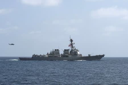 The U.S. Navy guided-missile destroyer USS Mason conducts divisional tactic maneuvers as part of a Commander, Task Force 55, exercise in the Gulf of Oman September 10, 2016. U.S. Navy/Mass Communication Specialist 1st Class Blake Midnight/Handout via REUTERS