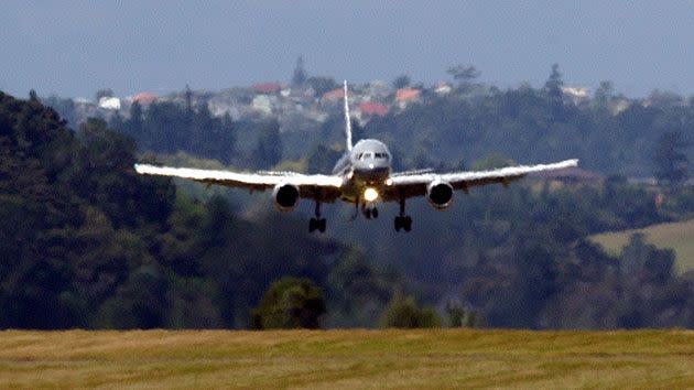 Mr Key spent Monday night in Queensland's Townsville after the group's RNZAF 757-200 transport aircraft developed mechanical problems. Source: Getty.