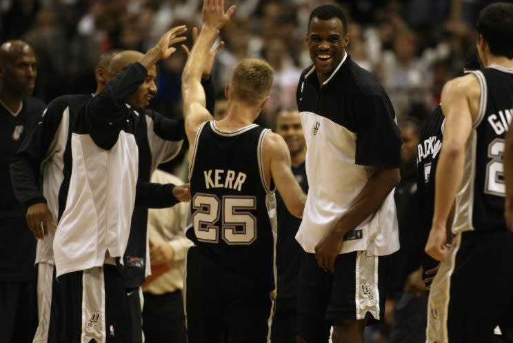 David Robinson and Steve Kerr celebrate the re-opening of a championship window. (Ronald Martinez/Getty Images)