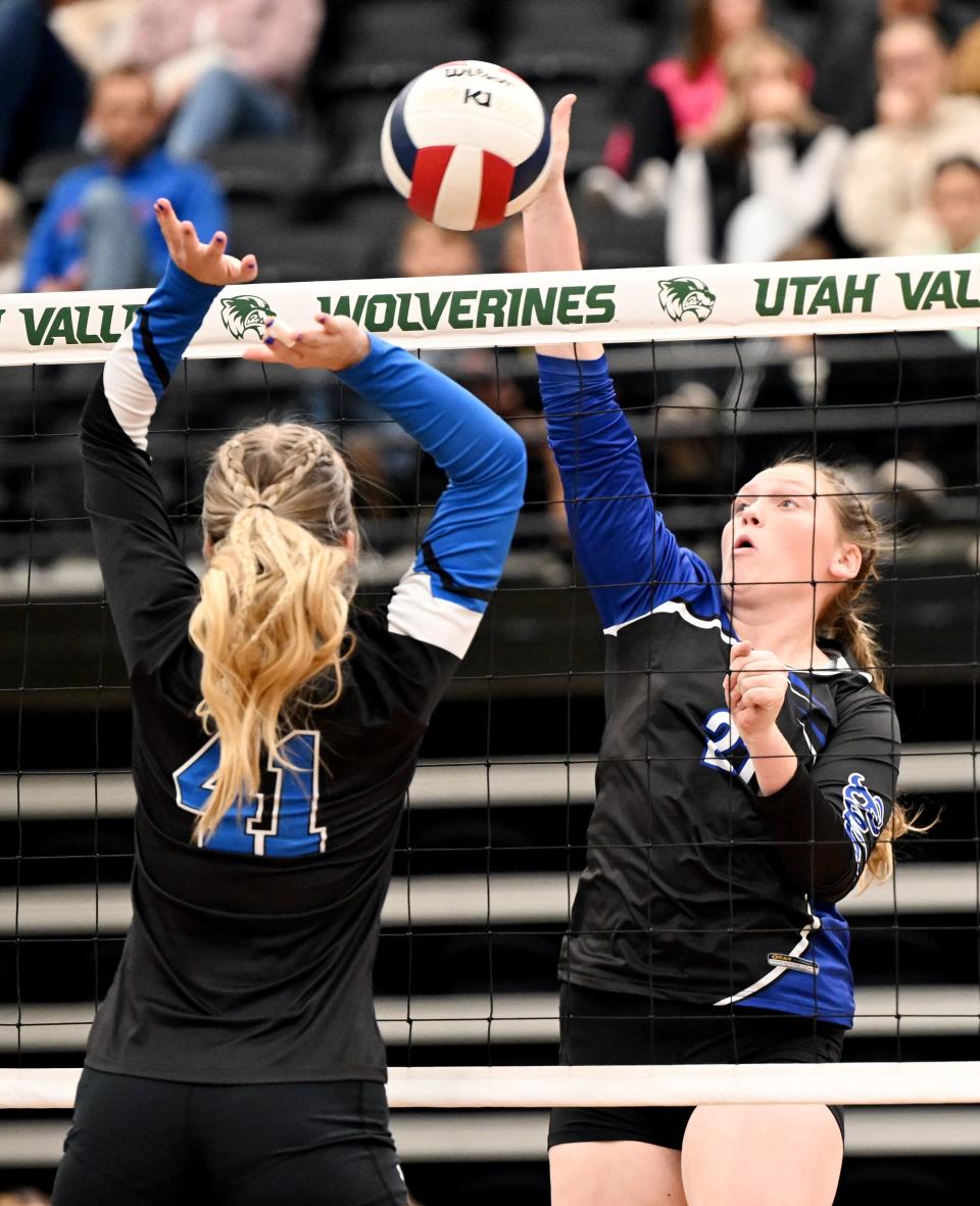Rich’s Hannah Scott tries to defend a spike by Panguitch’s Byntlee Owens as they play for the 1A Volleyball championship at UVU on Saturday, Oct. 28, 2023. | Scott G Winterton, Deseret News