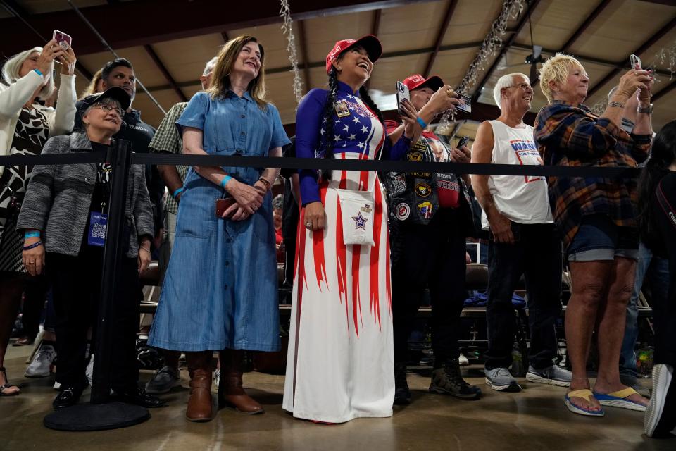 Supporters listen to former President Donald Trump speaks during a commit to caucus rally, Wednesday, Sept. 20, 2023, in Maquoketa, Iowa. (AP Photo/Charlie Neibergall)