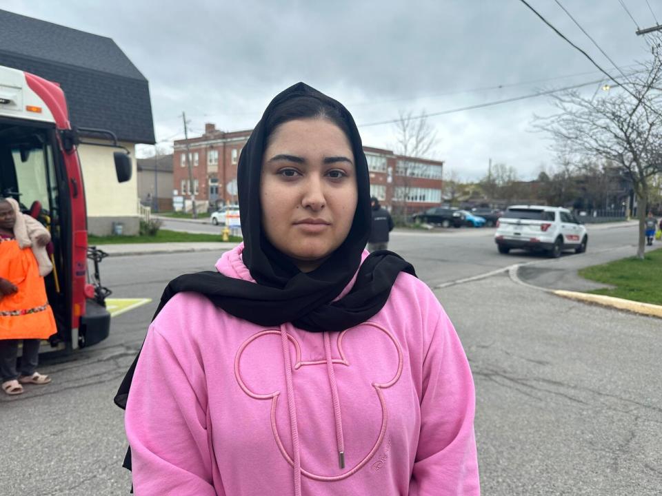 Karishma Rahmani had to take shelter on a neighbour's fifth floor balcony because thick, black smoke prevented her family from making it out of the building on Donald Street on May 2, 2024.