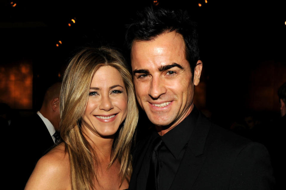 Jennifer Aniston (L) and actor-director Justin Theroux attend the 64th Annual Directors Guild Of America Awards cocktail reception