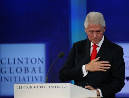 Former U.S. President Bill Clinton puts his hand over his heart after the closing of the Clinton Global Initiative 2016 (CGI) in New York, U.S., September 21, 2016. REUTERS/Shannon Stapleton