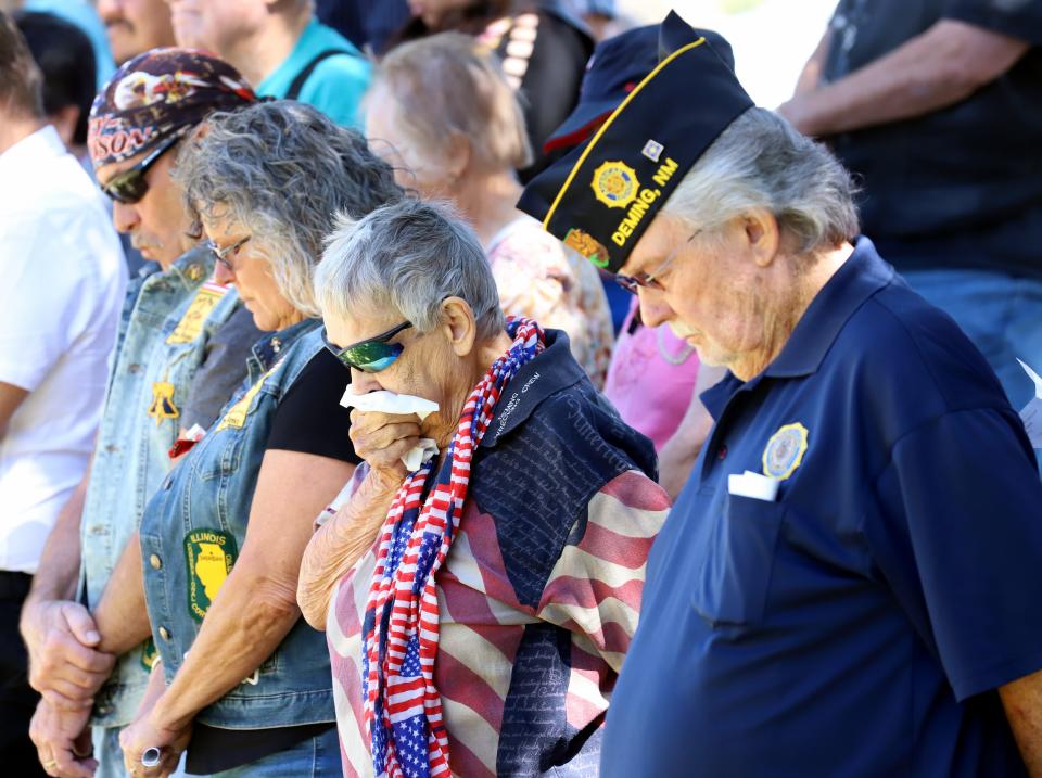 Local veterans and their families pay their respects to their fallen comrades.