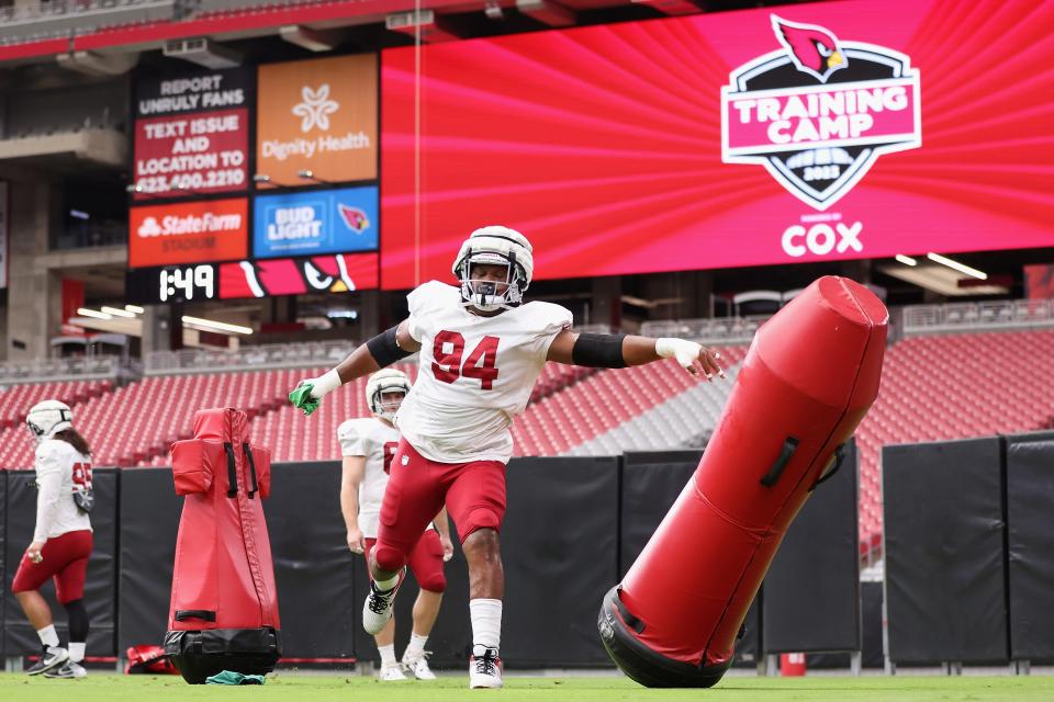 Defensive lineman Carlos Watkins #94 of the Arizona Cardinals participates in a team practice ahead of the NFL season at State Farm Stadium on Aug. 3, 2023, in Glendale.