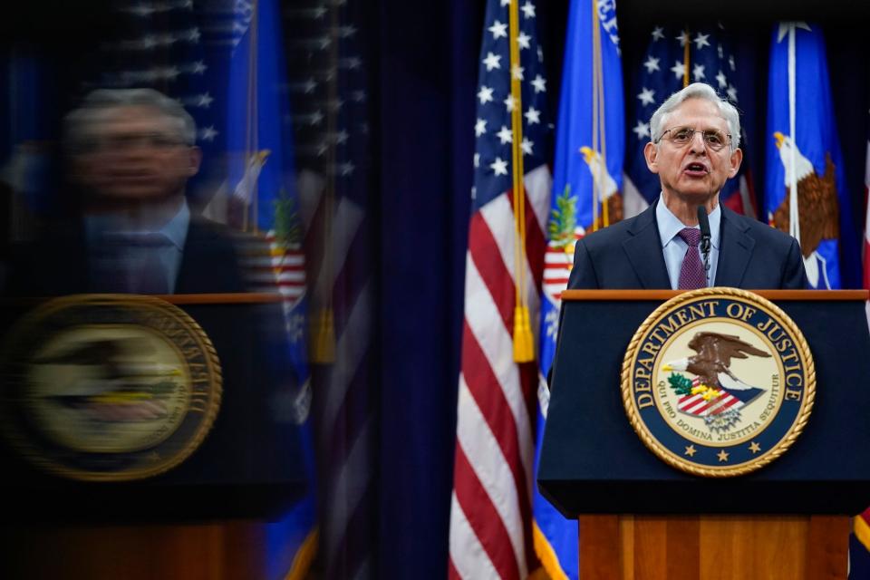 Attorney General Merrick Garland speaking at the Justice Department a day before the January 6, 2021, anniversary.