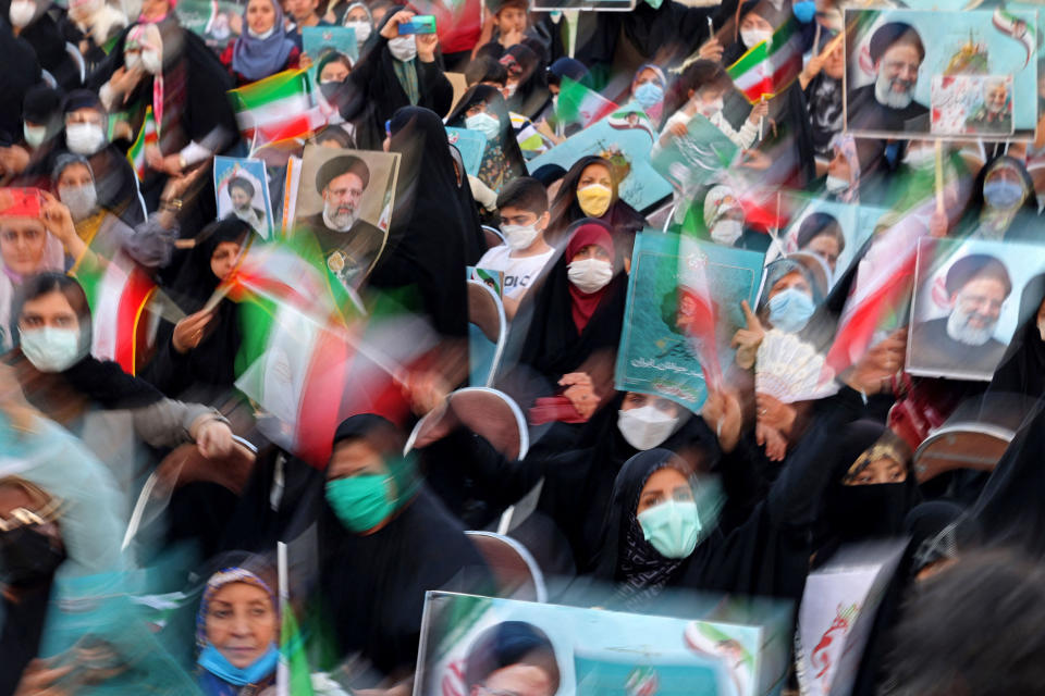 Image: Supporters of Iranian presidential candidate Ebrahim Raisi attend an election campaign rally in Tehran, Iran, on June 14, 2021. (Atta Kenare / AFP - Getty Images file)