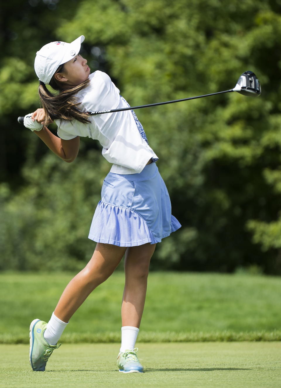 Twelve-year-old Canadian Michelle Liu hits her shot on the 10th hole during the first round of the CP Women's Open golf tournament in Aurora, Ontario, Thursday, Aug. 22, 2019. (Nathan Denette/The Canadian Press via AP)