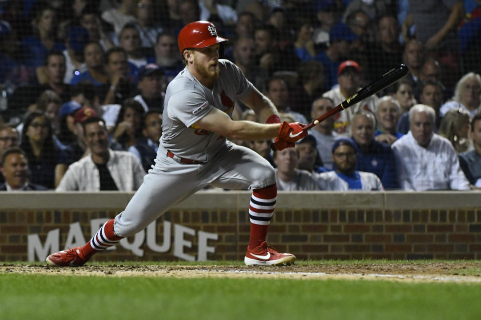 St. Louis Cardinals' Harrison Bader hits an RBI-single during the fifth inning of a baseball game against the Chicago Cubs, Thursday, Sept. 19, 2019, in Chicago. (AP Photo/Matt Marton)