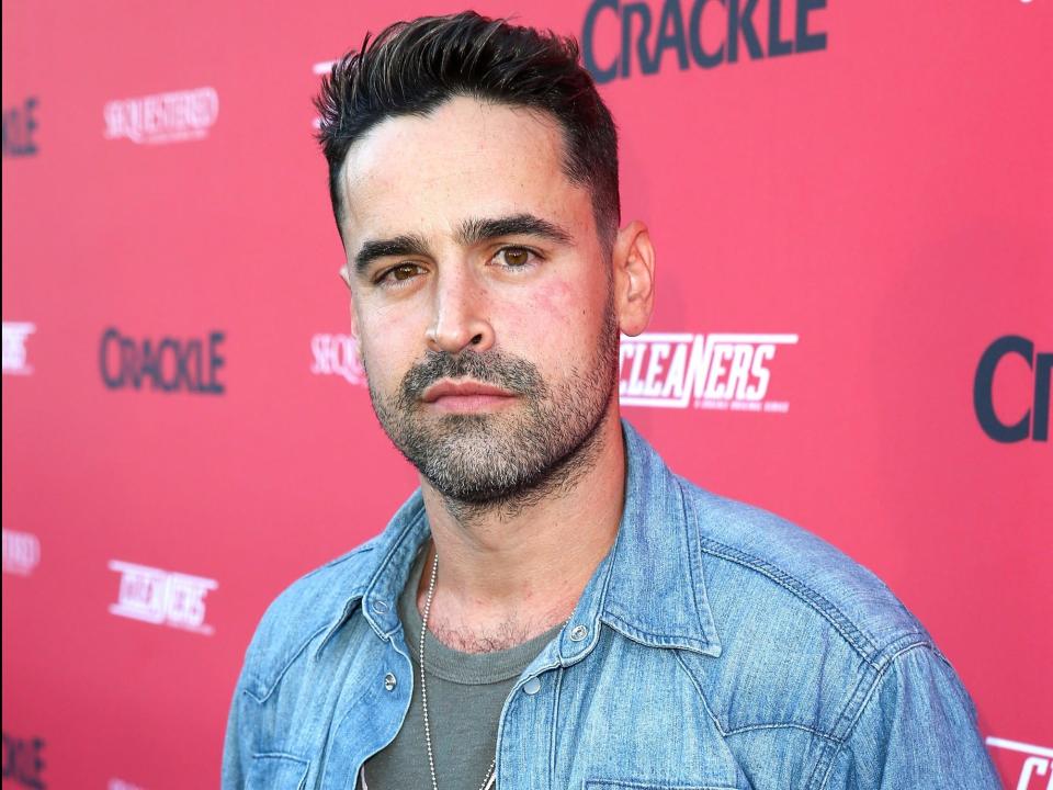 jesse bradford wearing jean jacket