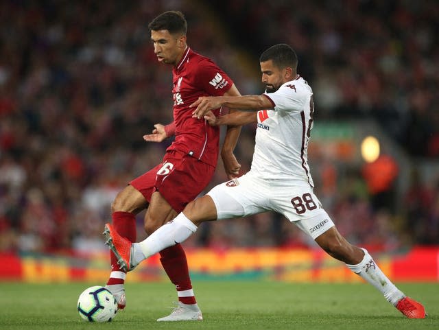 Porto's former Liverpool midfielder Marko Grujic (left) could face his old club on Tuesday (Nick Potts/PA).