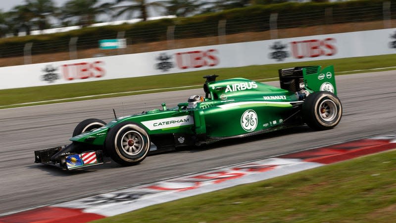 Kamui Kobayashi driving a Caterham during the 2014 Malaysian Grand Prix