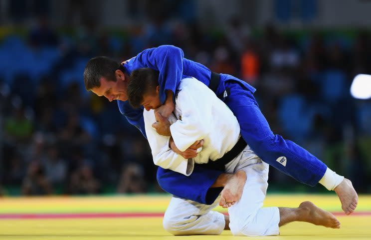 Dirk van Tichelt won his first Olympic judo medal Monday. (Getty)