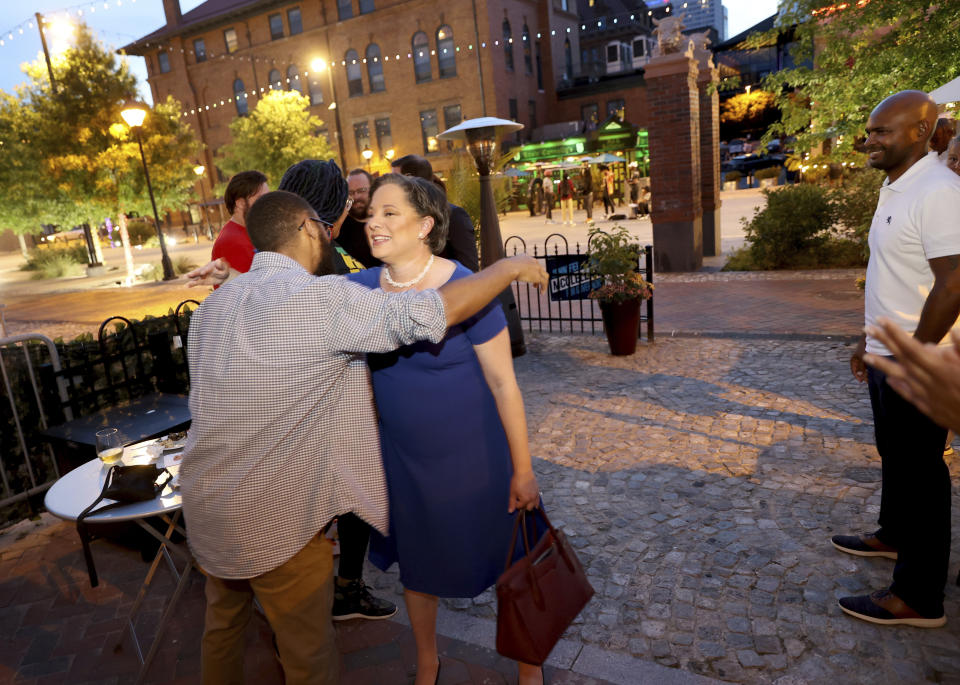 Jennifer McClellan, a candidate for Virginia Governor, greets supporters during Democratic Party primary election day in Richmond, Va., on Tuesday, June 8, 2021. (Daniel Sangjib Min/Richmond Times-Dispatch via AP)