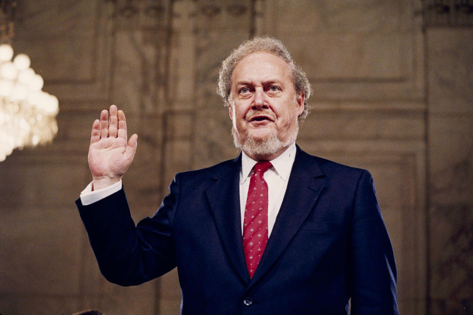 Judge Robert Bork, nominated by President Reagan to be an associate justice of the Supreme Court, is sworn before the Senate Judiciary Committee on Capitol Hill at his confirmation hearing, Sept. 15, 1987. (Photo: John Duricka/AP)