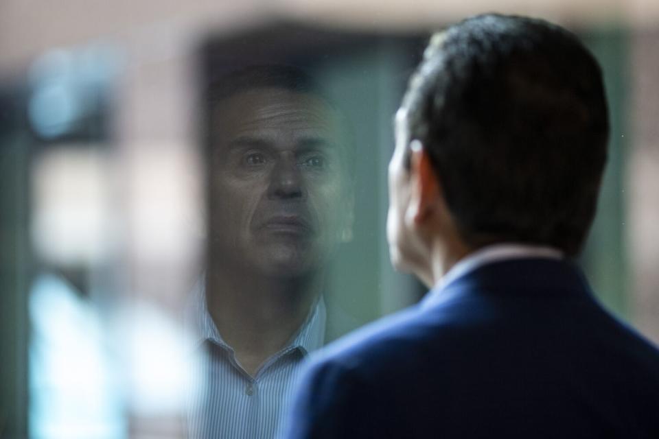 Former Los Angeles Mayor Antonio Villaraigosa looks out a window