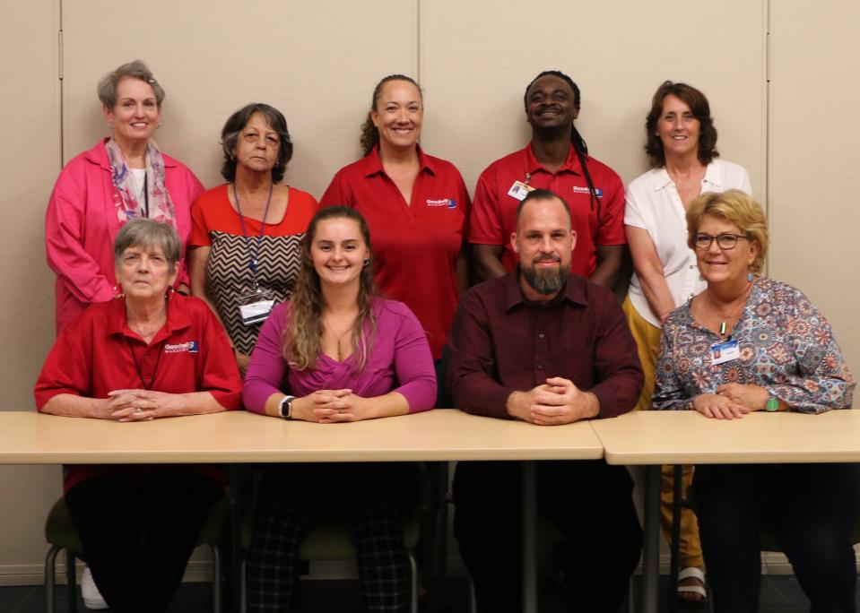 Goodwill Manasota’s GoodPartner coaches, Lynn Fabian, standing left, Diana Olivieri, Antonia Quiros (director of mission services), Deshane Collins and Cate Thorp; and Pam Bavo, seated left, Julia Cooper, Ross LaPointe and Susan Westcott.