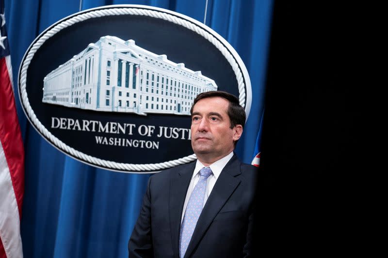 Assistant Attorney General for National Security John C. Demers attends a virtual news conference at the Department of Justice in Washington