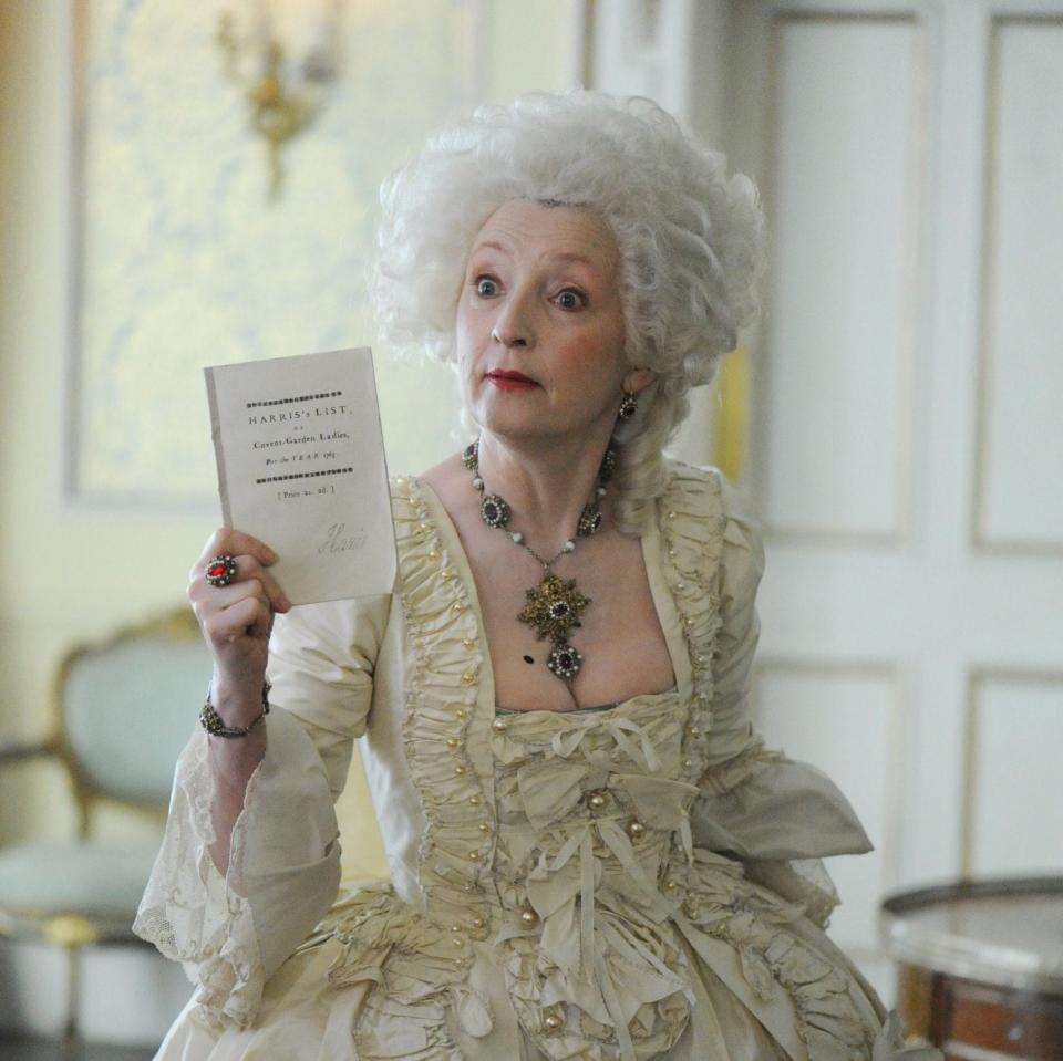 Lesley Manville as Lydia Quigley, holding Harris's List - ITV