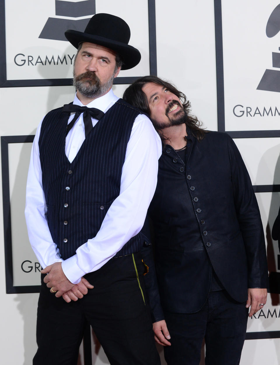 Krist Novoselic, left, and Dave Grohl arrive at the 56th annual Grammy Awards at Staples Center on Sunday, Jan. 26, 2014, in Los Angeles. (Photo by Jordan Strauss/Invision/AP)