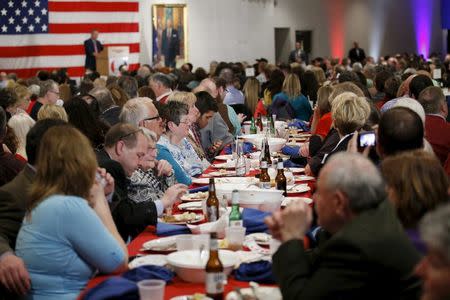 Attendees listen to the Republican U.S. presidential candidate John Kasich during Milwaukee County GOP's 'Wisconsin Decides 2016' presidential candidate event at the American Serb Banquet Hall in Milwaukee April 1, 2016. REUTERS/Kamil Krzaczynski