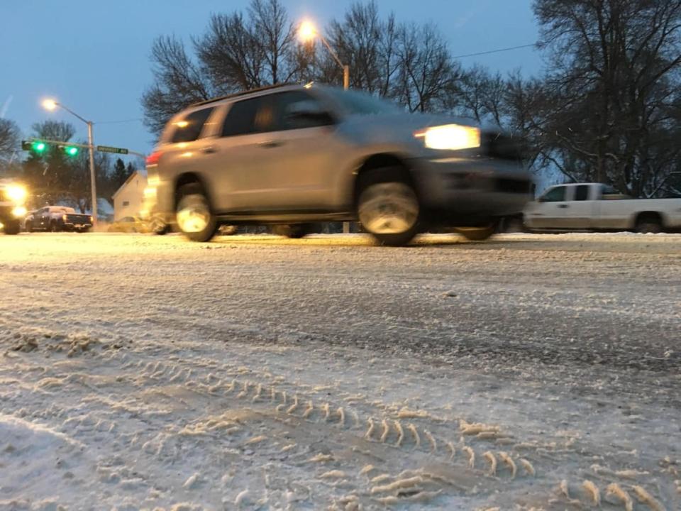 Drivers are being urged to use caution on Alberta roads and highways Monday due to a winter storm bringing a range of challenging conditions, from freezing rain to blowing snow. (David Bajer/CBC - image credit)