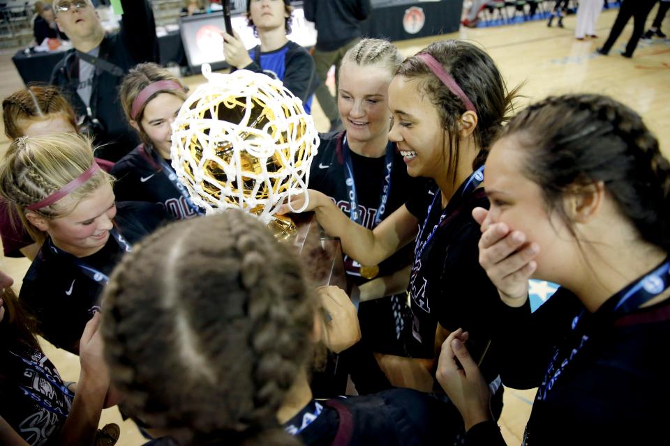 Pocola celebrates after beating Howe for the Class 2A girls basketball state championship game Saturday at State Fair Arena.