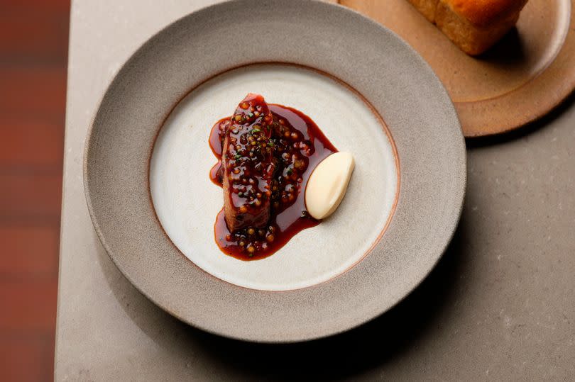 Roasted Sladesdown duck with fig leaf, ibis celeriac and a mini loaf of wholemeal bread