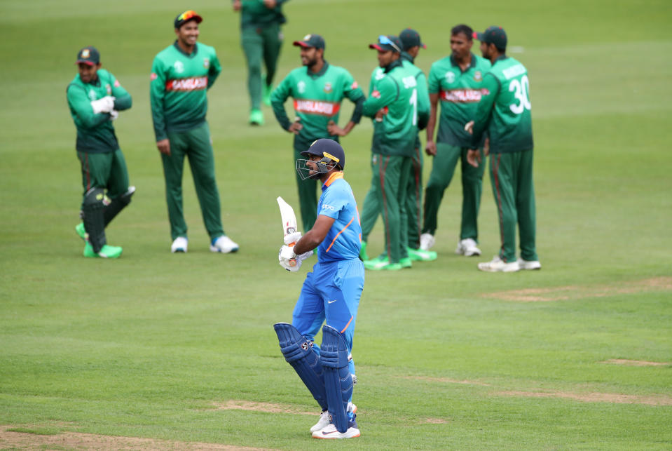 Cricket - ICC Cricket World Cup warm-up match - Bangladesh v India - Cardiff Wales Stadium, Cardiff, Britain - May 28, 2019   India's Vijay Shankar walks off after being dismissed by Bangladesh's Rubel Hossain   Action Images via Reuters/Peter Cziborra