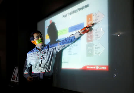 FILE PHOTO: General Manager of Lion Air's Angkasa Training Center, Capt. Dibyo Soesilo gestures as he explains the general training curriculum to the media at the airline group's training center near Jakarta, Indonesia, November 12, 2018. REUTERS/Willy Kurniawan