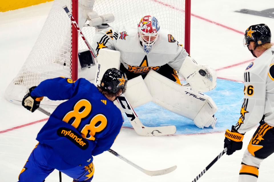 Team McDavid goalkeeper Sergei Bobrovsky (72) of the Florida Panthers makes a save against Team Matthews right wing William Nylander (88) of the Toronto Maple Leafs in the 2024 NHL All-Star Game at Scotiabank Arena.