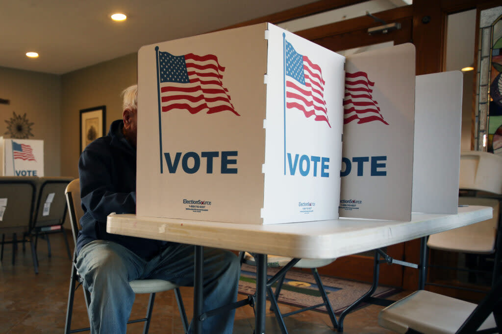 A Sioux Falls resident votes in the city and school board election at Southern Hills United Methodist Church on April 9, 2024. (Makenzie Huber/South Dakota Searchlight)