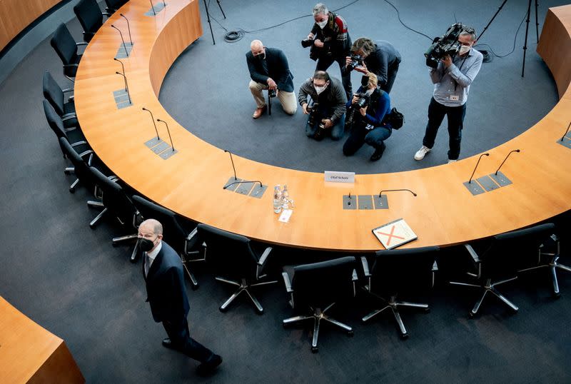 FILE PHOTO: German Finance Minister Scholz testifies before a parliament committee, in Berlin