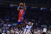 Philadelphia 76ers' Tyrese Maxey, left, drives past New York Knicks' Kemba Walker, right, during the first half of an NBA basketball game Tuesday, Oct. 26, 2021, in New York. (AP Photo/Frank Franklin II)