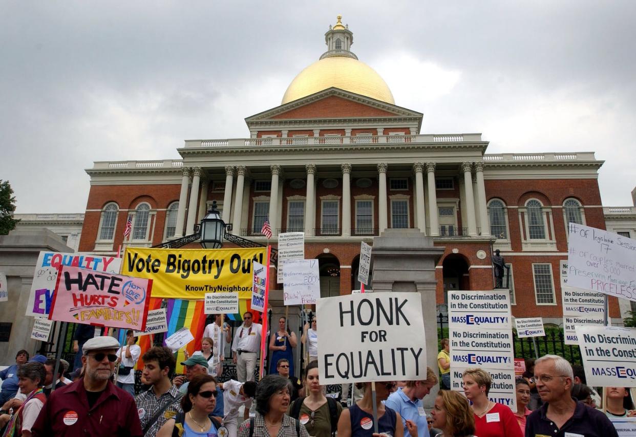 <span class="caption">Marriage equality supporters in 2006 probably had no idea the law they advocated would spur innovation.</span> <span class="attribution"><a class="link " href="https://www.gettyimages.com/detail/news-photo/proponents-of-gay-marriage-hold-signs-outside-the-news-photo/71424729" rel="nofollow noopener" target="_blank" data-ylk="slk:Darren McCollester/Getty Images News via Getty Images;elm:context_link;itc:0;sec:content-canvas">Darren McCollester/Getty Images News via Getty Images</a></span>