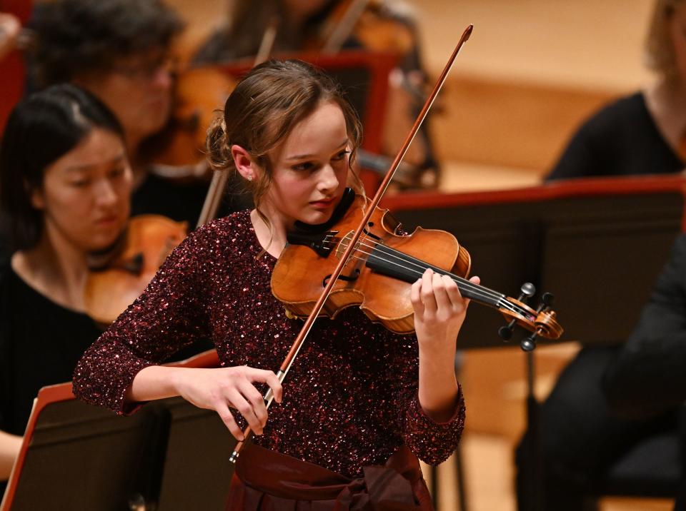 Sophie Wilkes plays the violin during the Salute to Youth concert at Abravanel Hall in Salt Lake City on Wednesday, Nov. 22, 2023. | Scott G Winterton, Deseret News