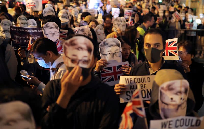 Protestors attend a rally outside the British Consulate General in Hong Kong