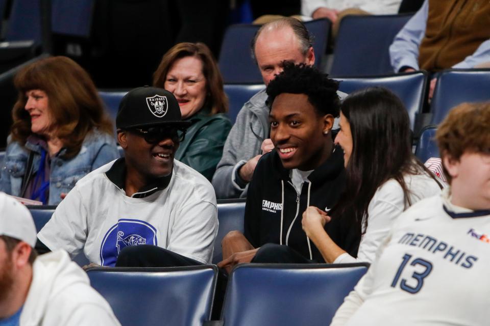 Memphis transfer Nae’Qwan Tomlin sits in the stands before the game between Clemson University and University of Memphis at FedExForum in Memphis, Teen., on Saturday, December 16, 2023.